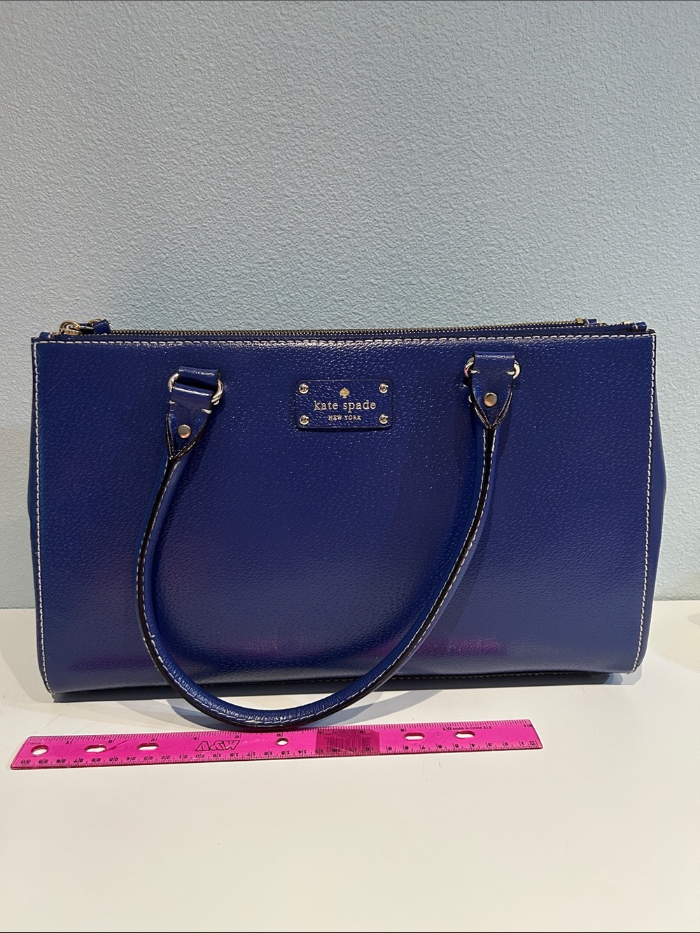 kate spade cobalt blue leather tote with gold-tone logo*